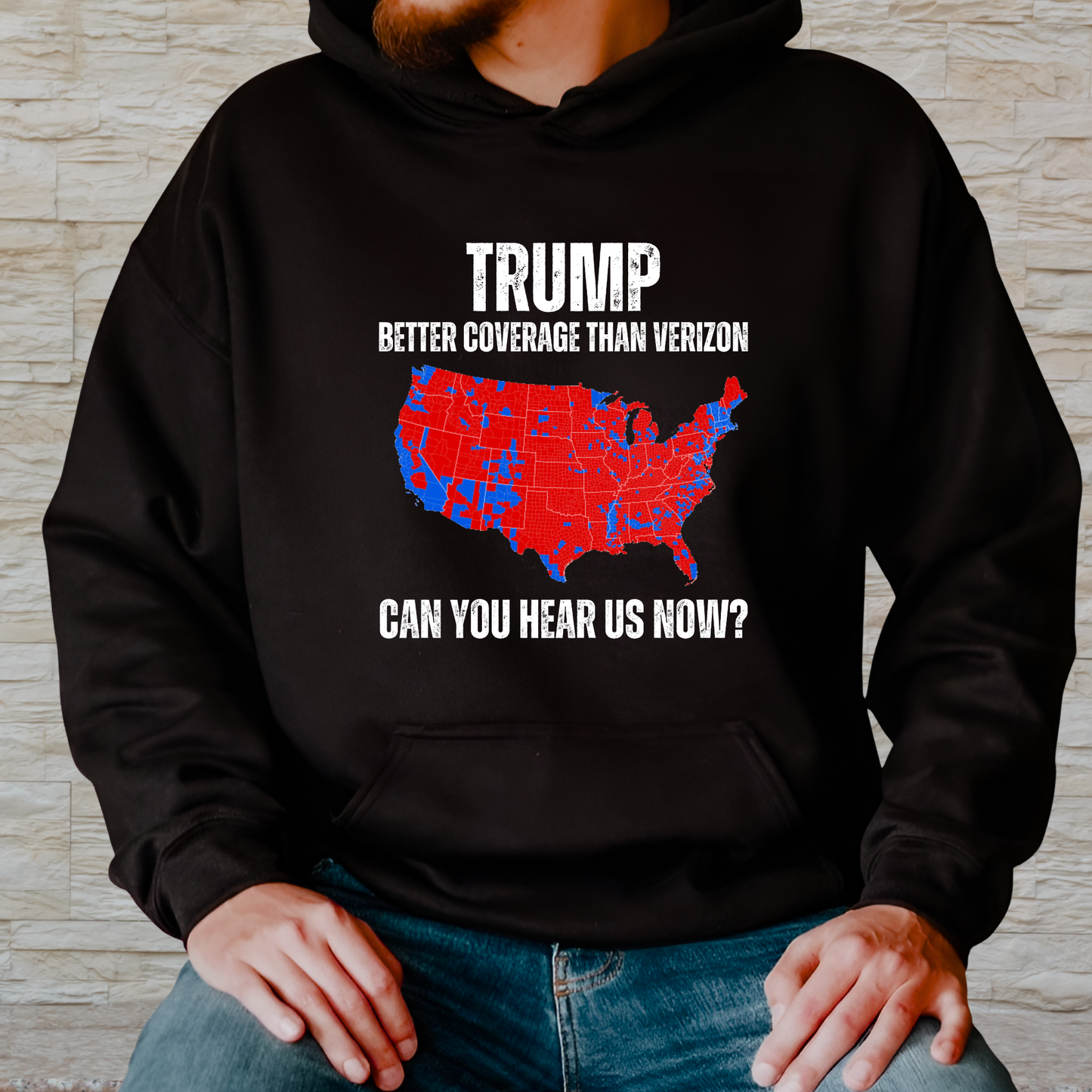 Man wearing a black Trump Better Coverage than Verizon Hoodie