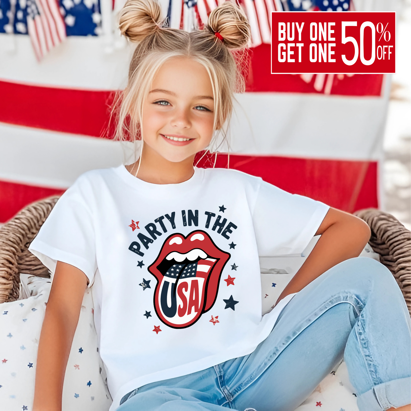 Blonde girl in space buns wearing white “Party in the USA” tee with patriotic lips design in front of American flag backdrop. Cute and festive kids’ shirt for Independence Day, USA parades, fireworks, and summer celebrations.