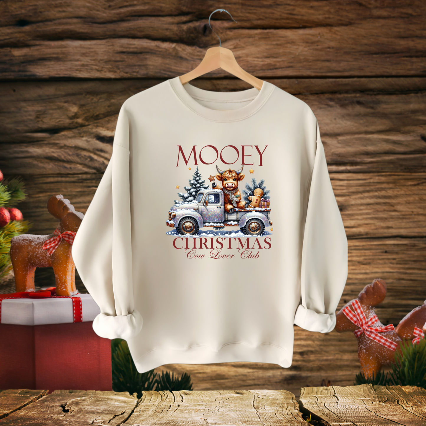 Light Sand sweatshirt with βMooey Christmas Cow Lover Clubβ graphic