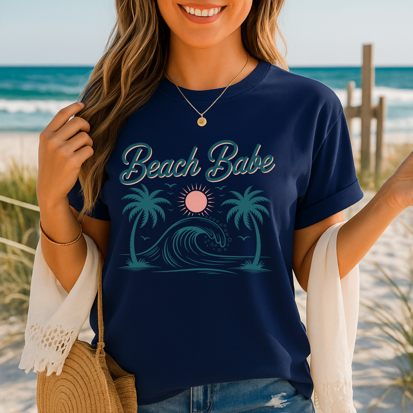 Navy Beach Babe T-shirt worn by smiling woman at the beach, vintage palm and wave design