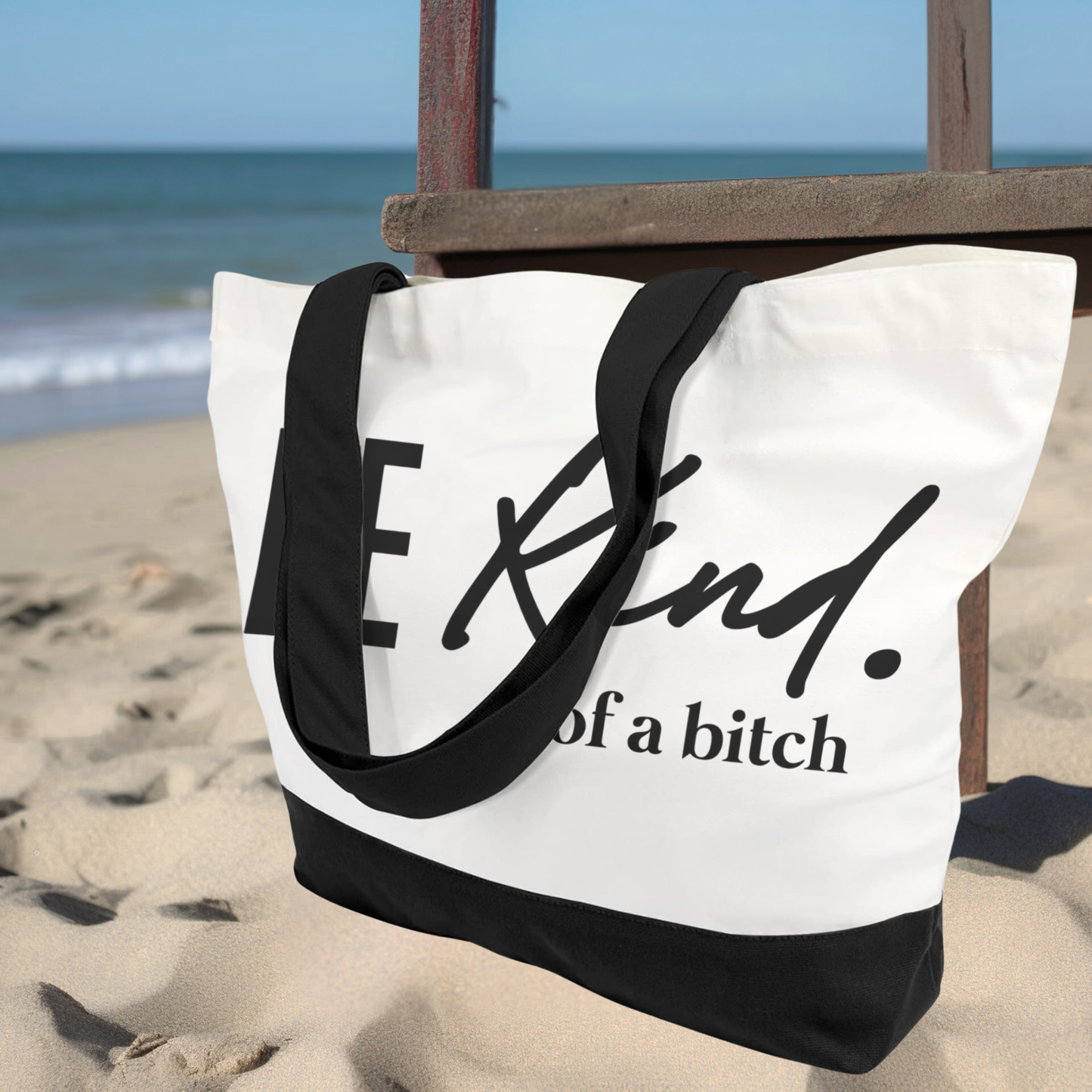 Beach scene with large funny tote bag “Be Kind ...of a Bitch”