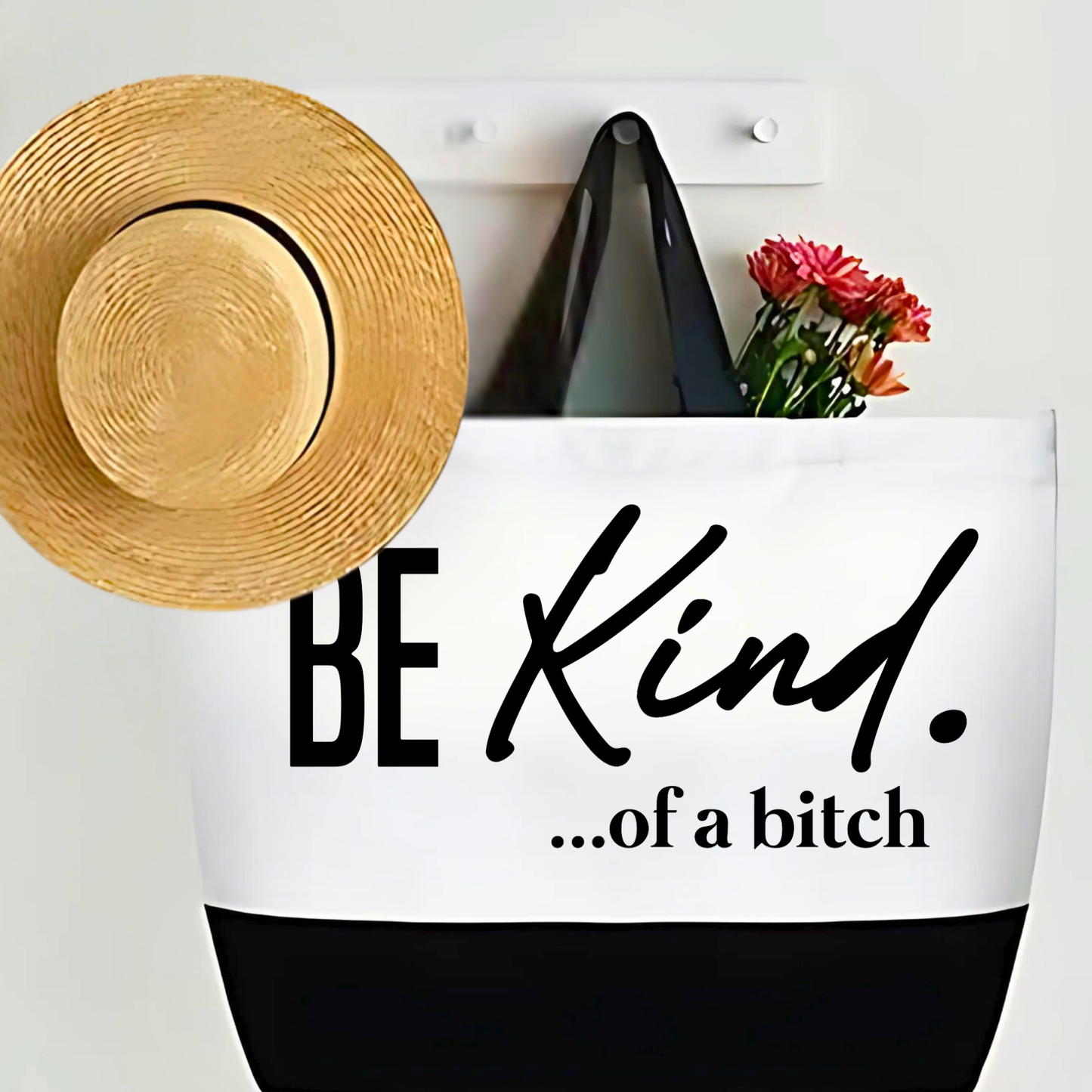 Canvas bag with hat and flowers reading “Be Kind ...of a Bitch”