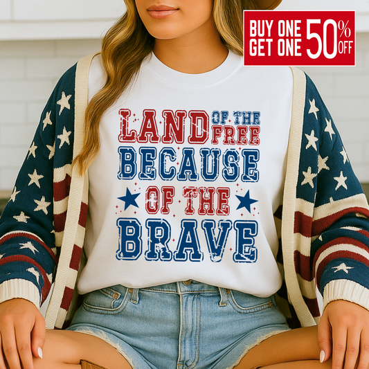 Close-up of white t-shirt with red, blue, and navy patriotic print, styled with casual denim shorts