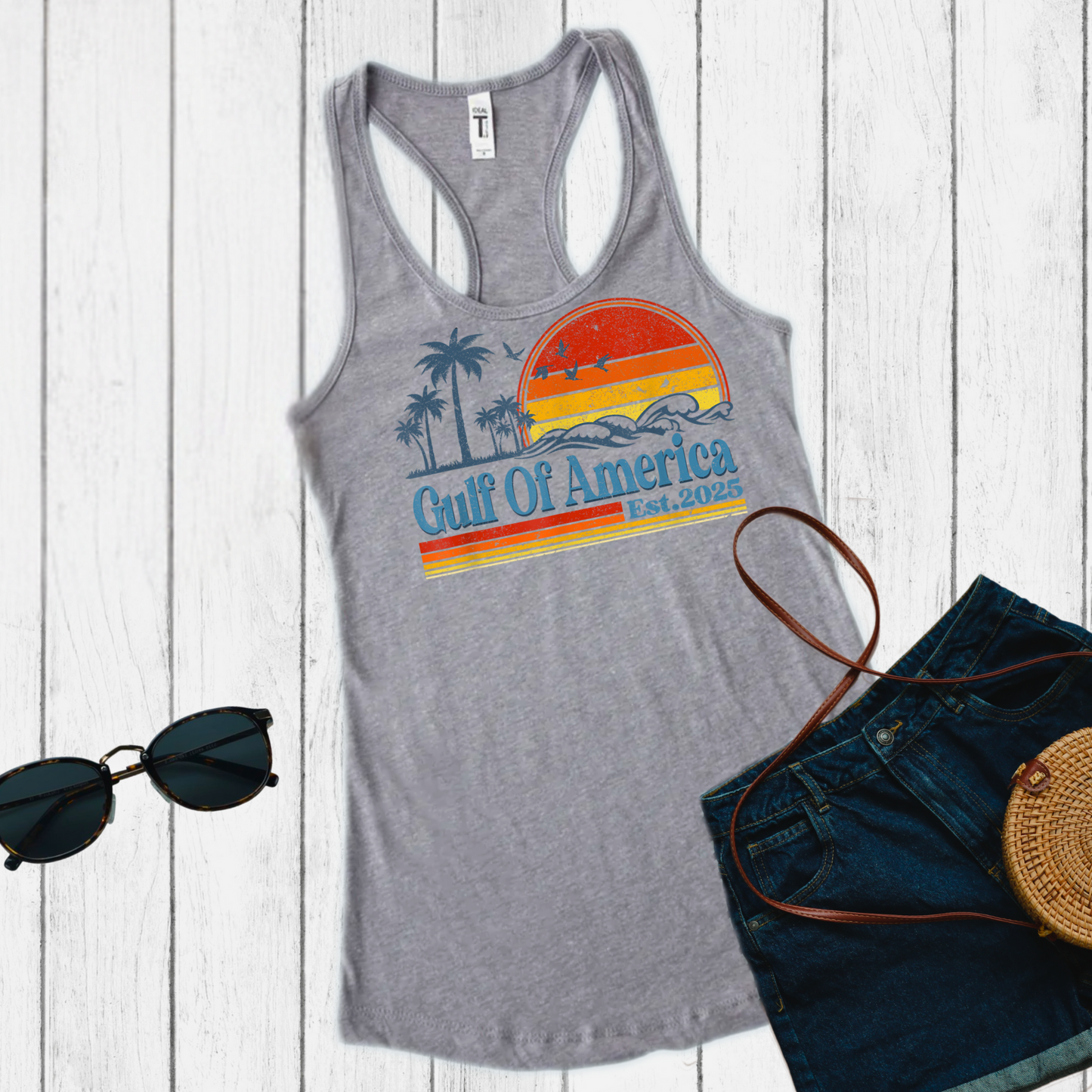 Relax in coastal style with our Gulf Of America Est. 2025 tank top. Designed for sun-seekers, ocean lovers, and those who appreciate a vintage coastal aesthetic, this soft and breathable racerback tank is perfect for summer adventures