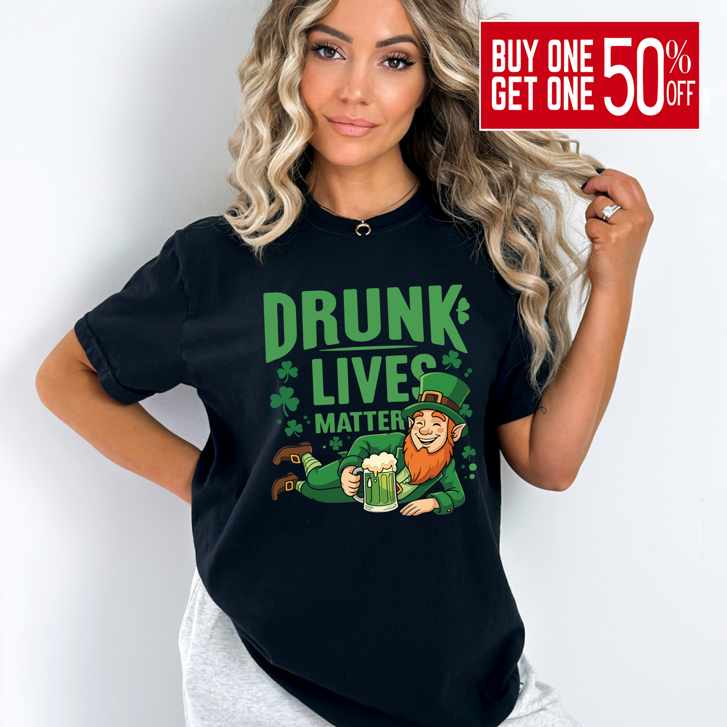 Woman wearing a black Drunk Lives Matter Tshirt with a leprechaun holding a beer mug