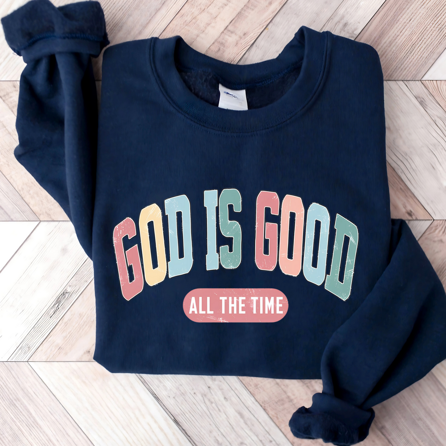 Navy 'God Is Good' Christian sweatshirt, faith-based crewneck with inspirational design.