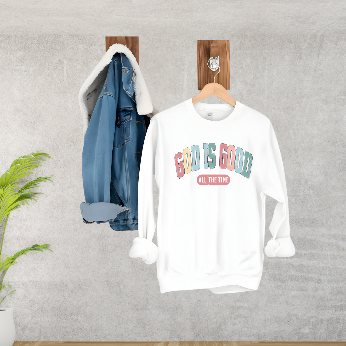White 'God Is Good' Christian sweatshirt, faith-based crewneck with inspirational design.