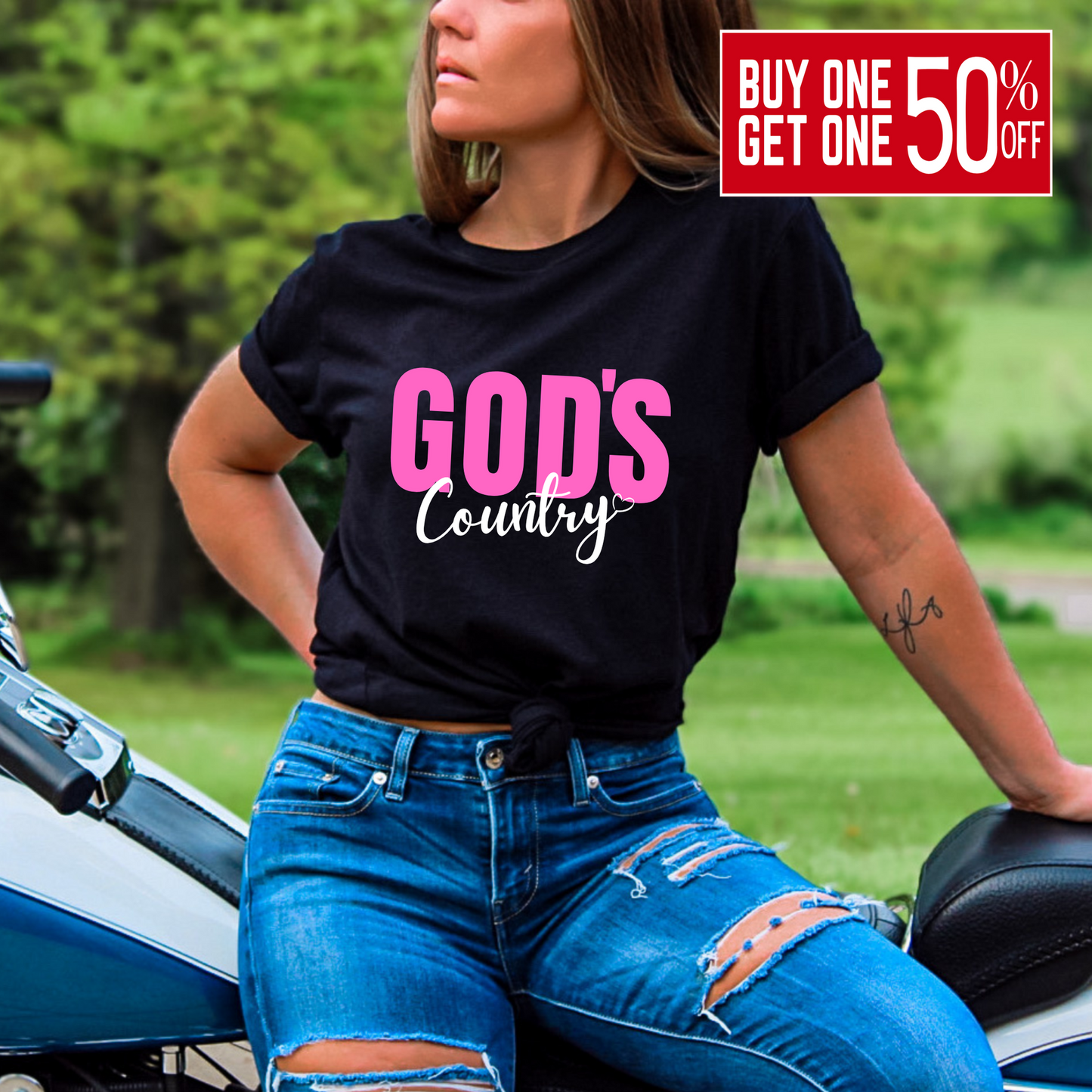 Black God's Country Christian T-shirt with pink and white text, perfect for patriotic believers who love faith-based apparel