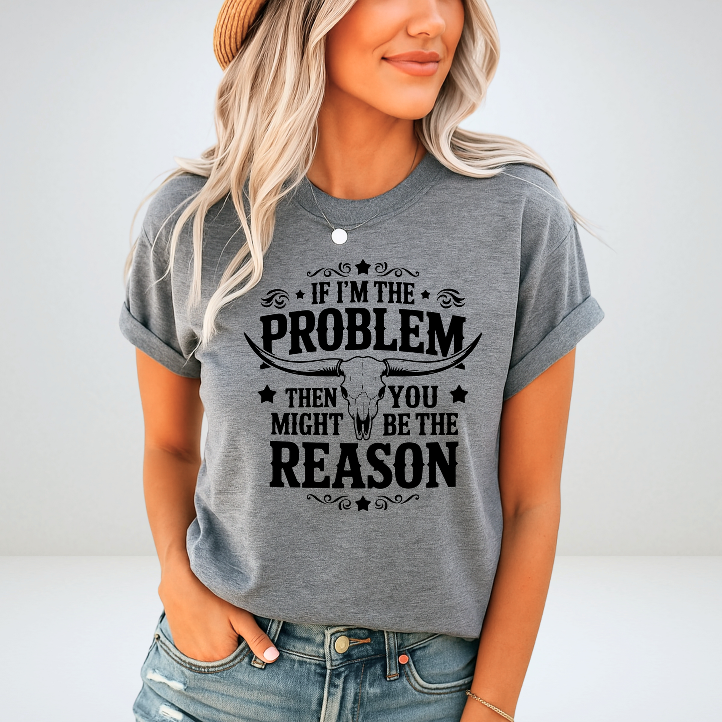 Gray T-shirt mockup – woman in hat wearing “If I’m the Problem” western cow skull shirt