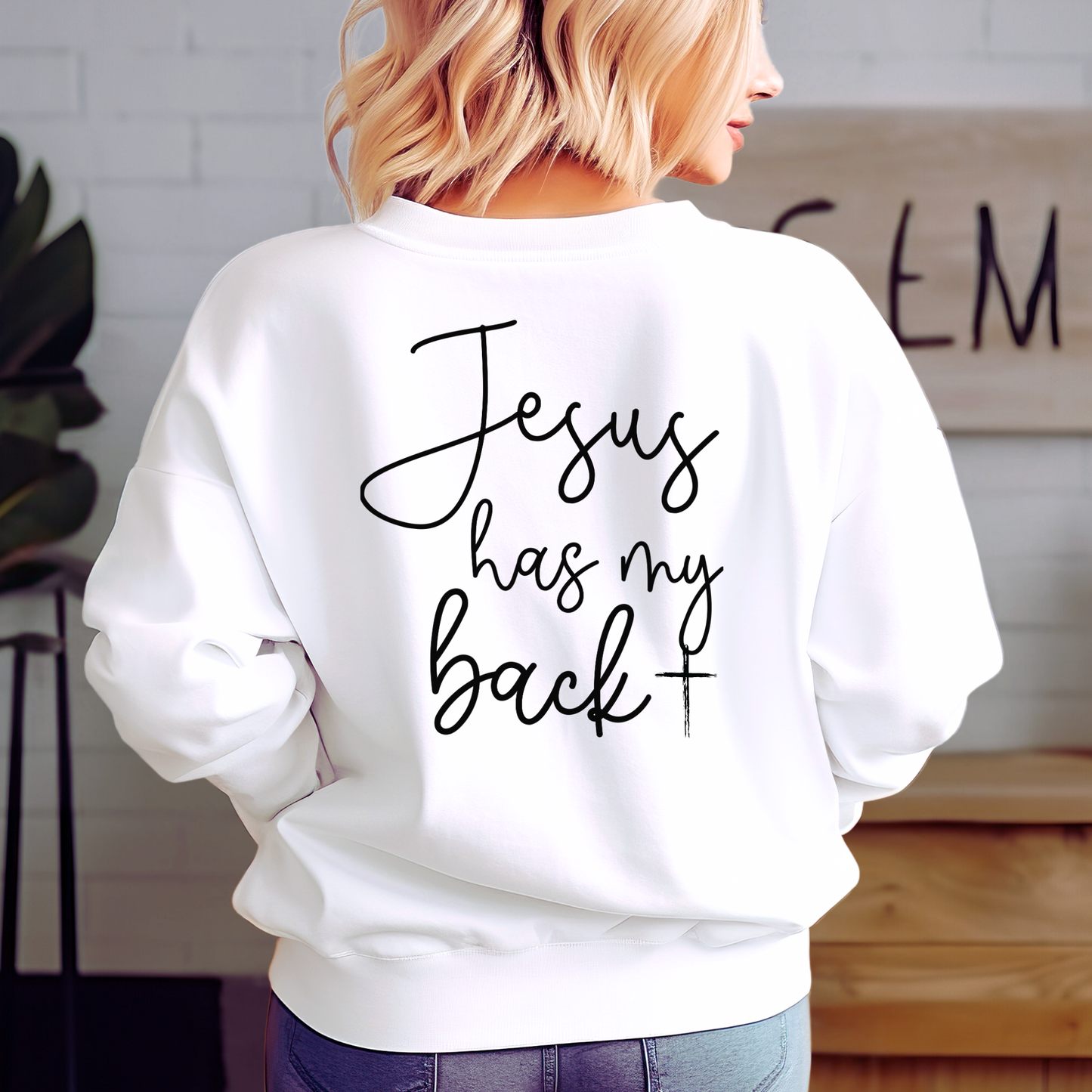 Inspirational unisex Christian sweatshirt styled with denim shorts