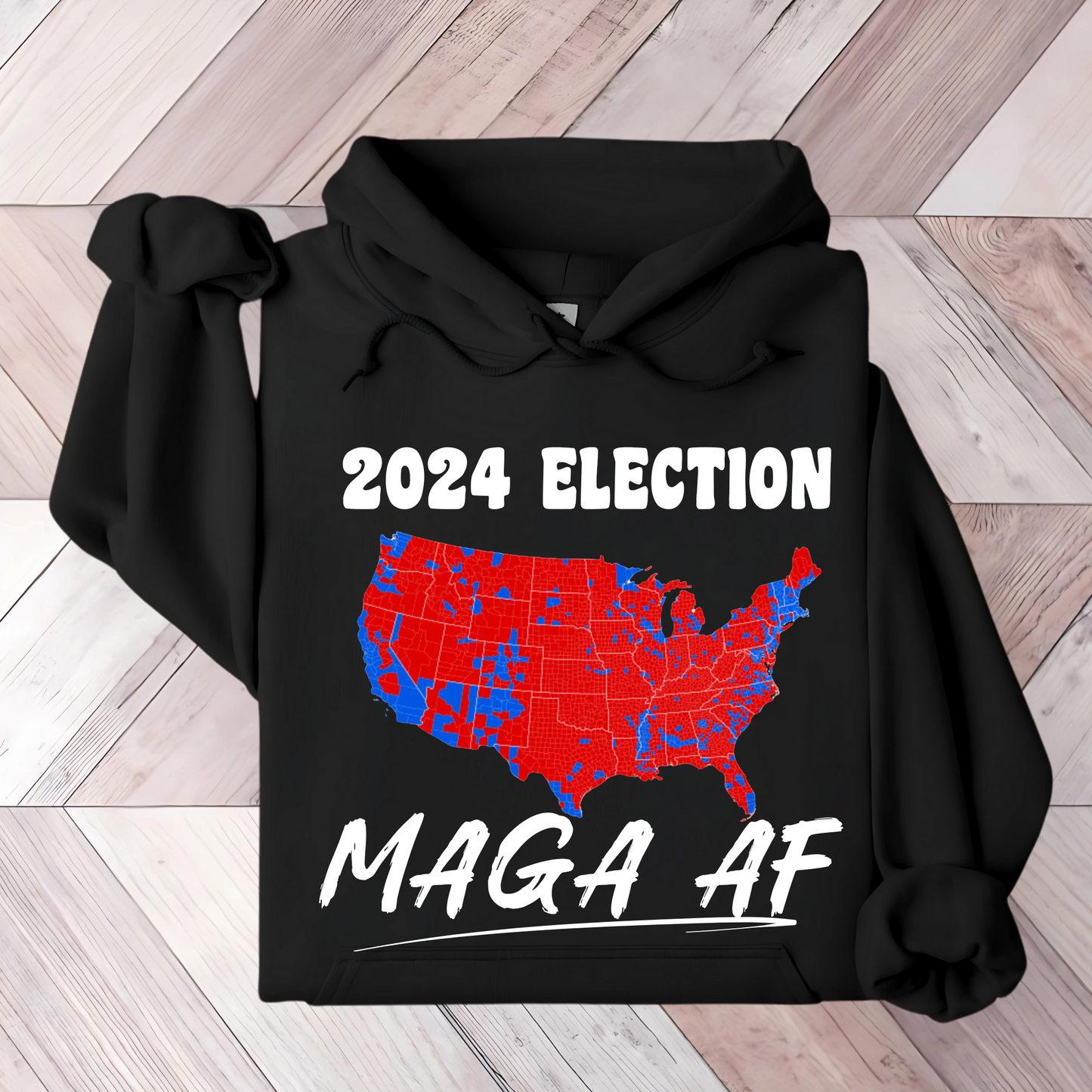 Black hoodie with a bold political graphic showing a red and blue U.S. map labeled “2024 Election” above and “MAGA AF” in large white letters below, representing conservative support in the election