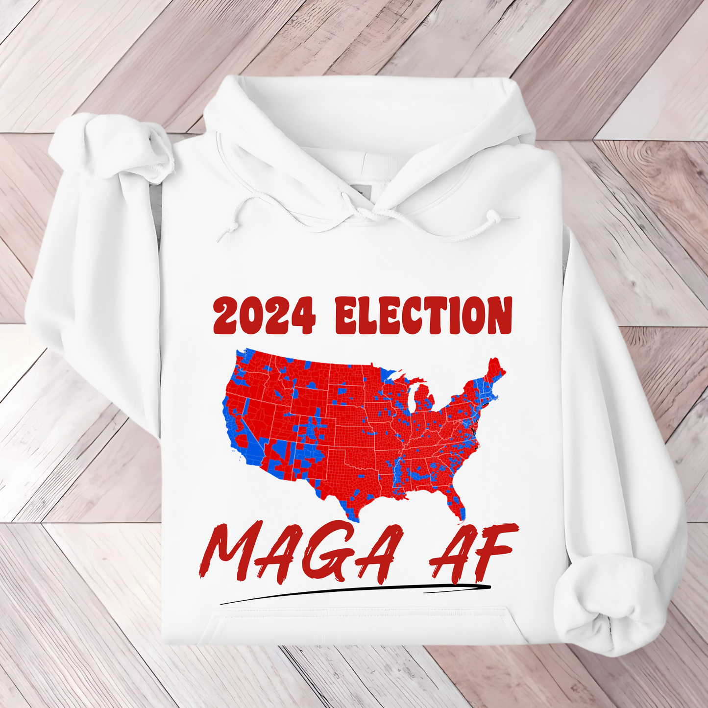 White hoodie with a bold political graphic showing a red and blue U.S. map labeled “2024 Election” above and “MAGA AF” in large white letters below, representing conservative support in the election