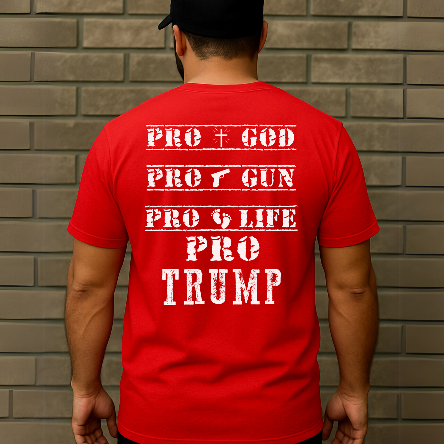 Red tee with distressed stencil-style 'Pro God Pro Gun Pro Life Pro Trump' text, worn by man facing away