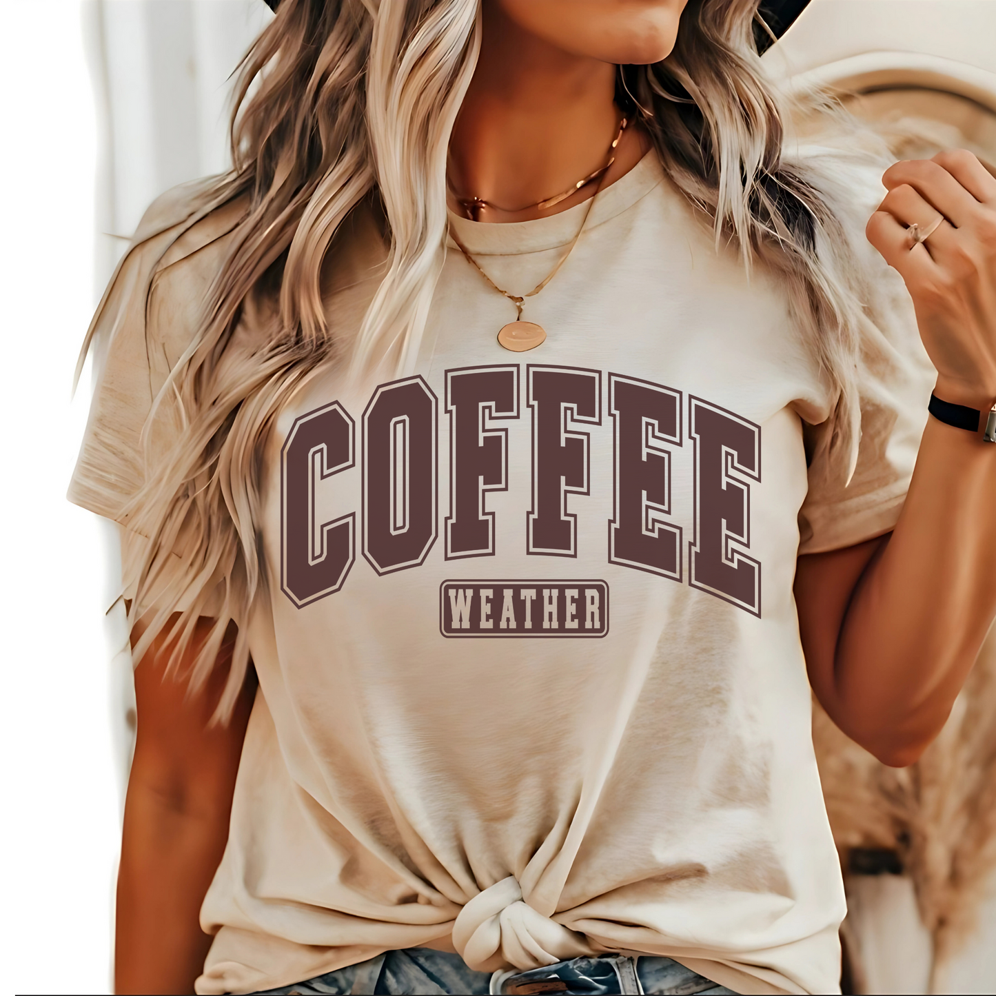 Sand colored "Coffee Weather" shirt with brown lettering, styled with knot