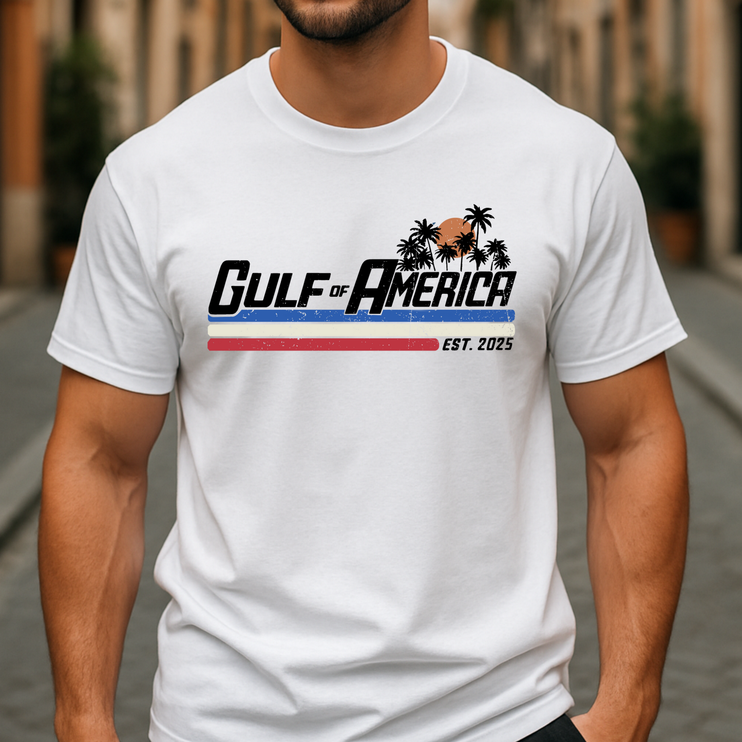 Sitting man modeling white patriotic Gulf of America shirt with front print only