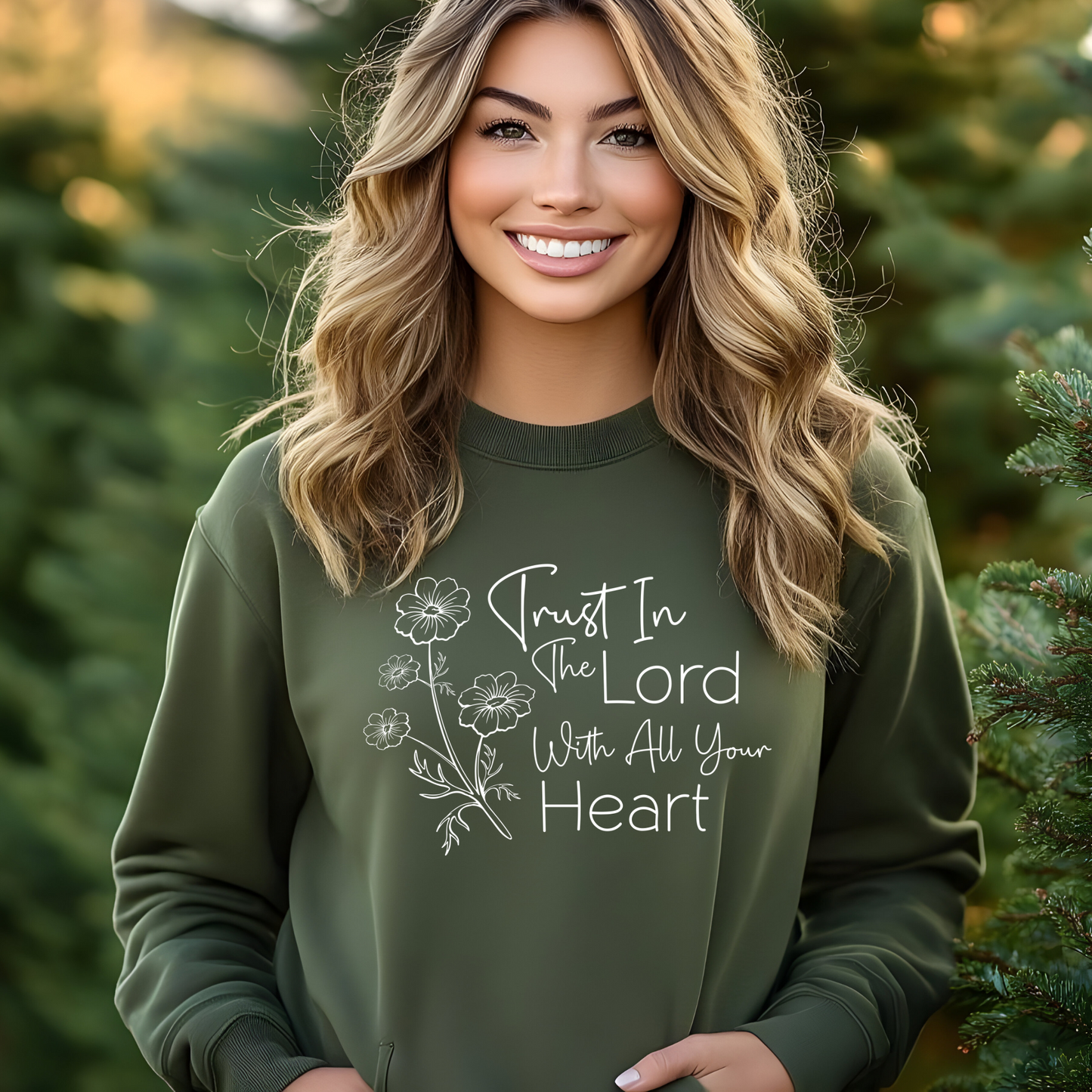 Christian sweatshirt with 'Trust in the Lord with all your heart' Bible verse design and floral illustration – Faith-based apparel for women
