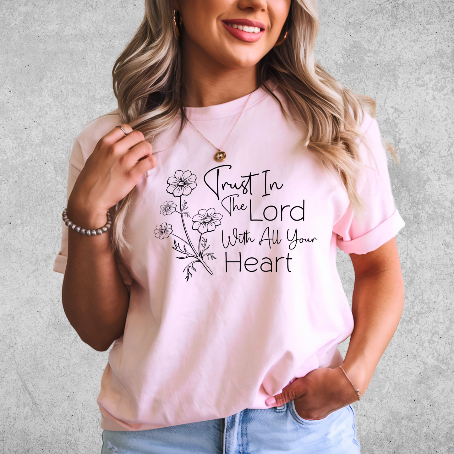 "Religious women's T-shirt with an uplifting Bible verse and floral artwork. Faith-based Christian apparel for everyday wear and church gatherings.