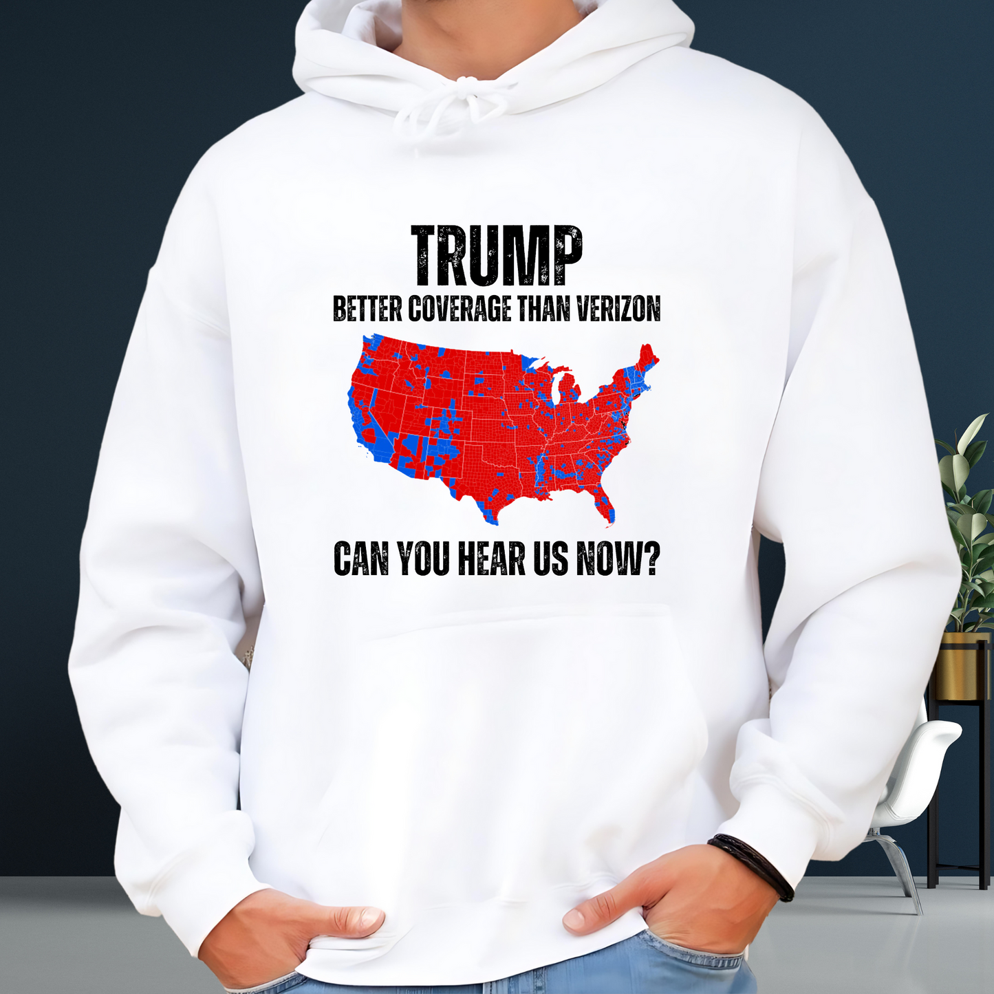 Man wearing a white Trump Better Coverage than Verizon Hoodie