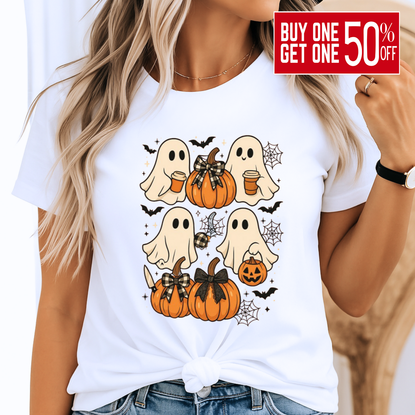 White Halloween T-shirt with cute ghost and pumpkin design. Perfect spooky season tee for women, styled with a knot tie for a trendy fall outfit. Ideal for pumpkin patch trips or Halloween celebrations.