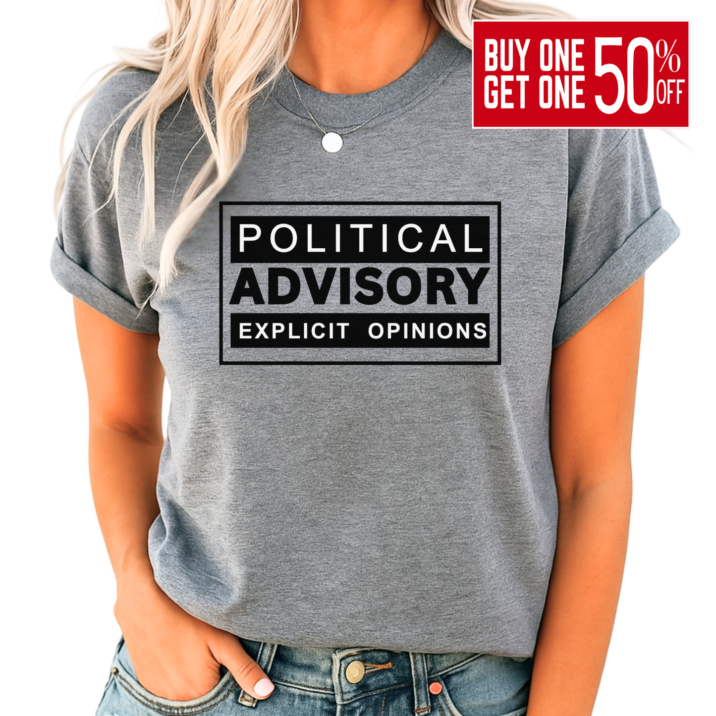 Woman wearing gray conservative “Political Advisory” t-shirt with black print, rolled sleeves and jeans.