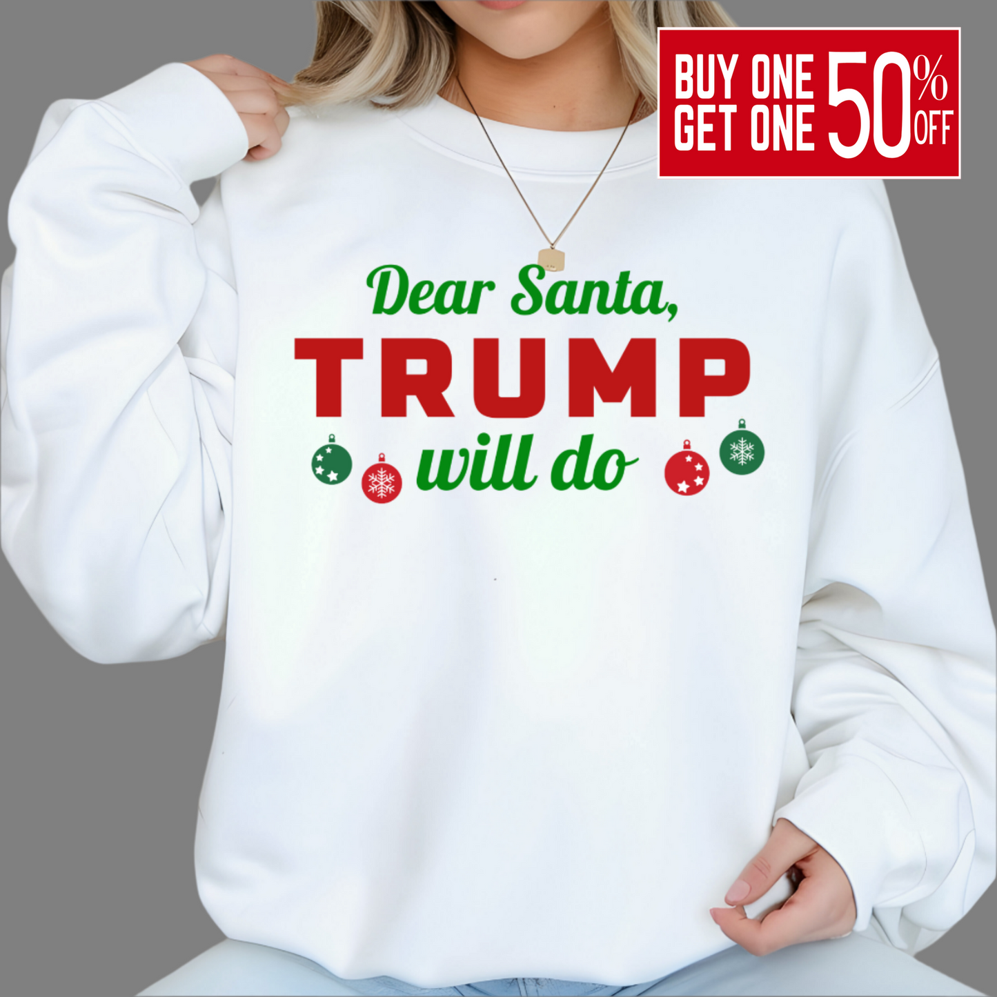 Woman wearing white “Dear Santa, Trump Will Do” Christmas sweatshirt with red and green lettering