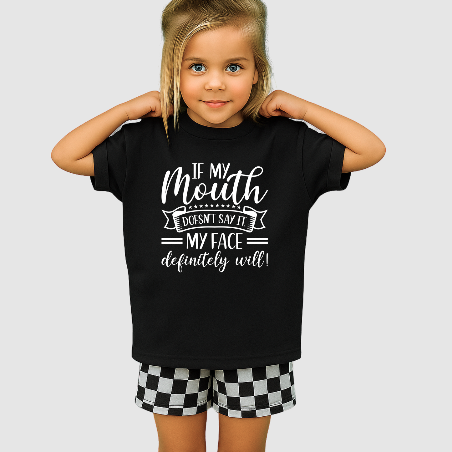 Young girl wearing black graphic tee with sassy quote