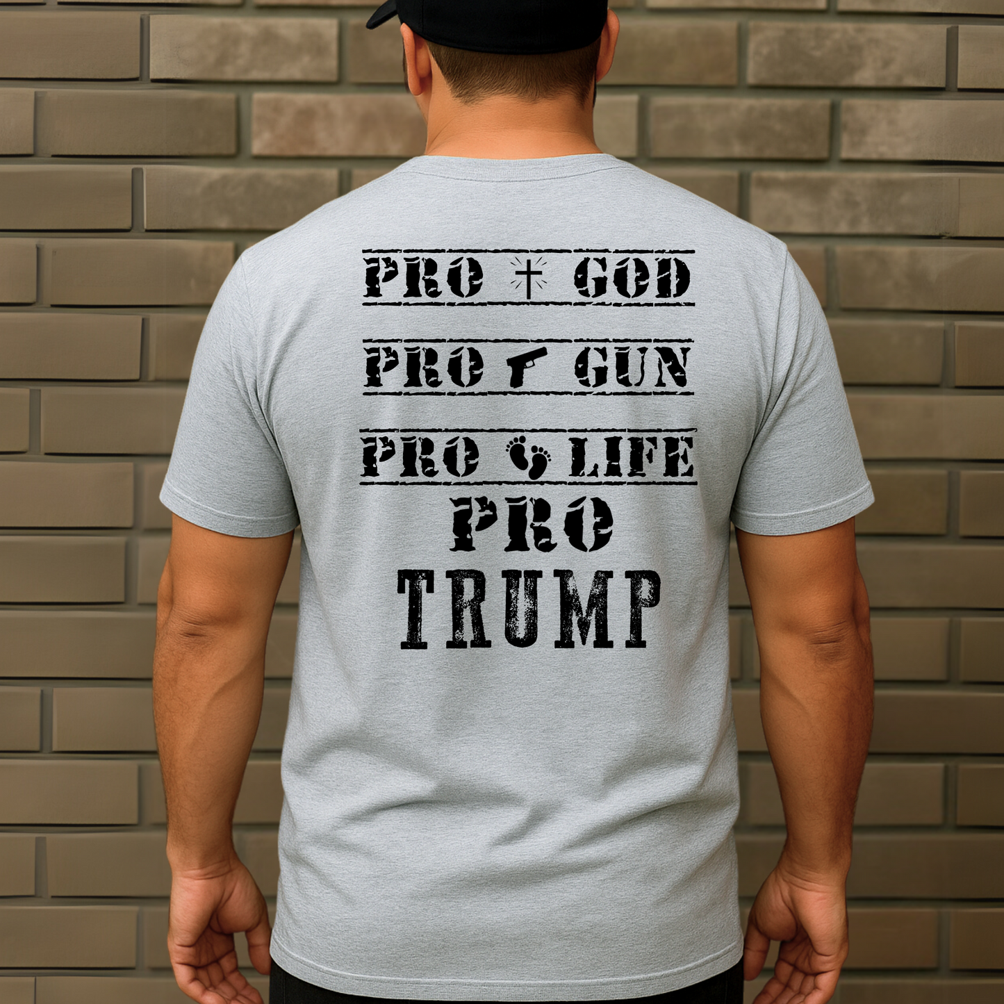 gray patriotic shirt featuring 'Pro God Pro Gun Pro Life Pro Trump' graphic design on the back