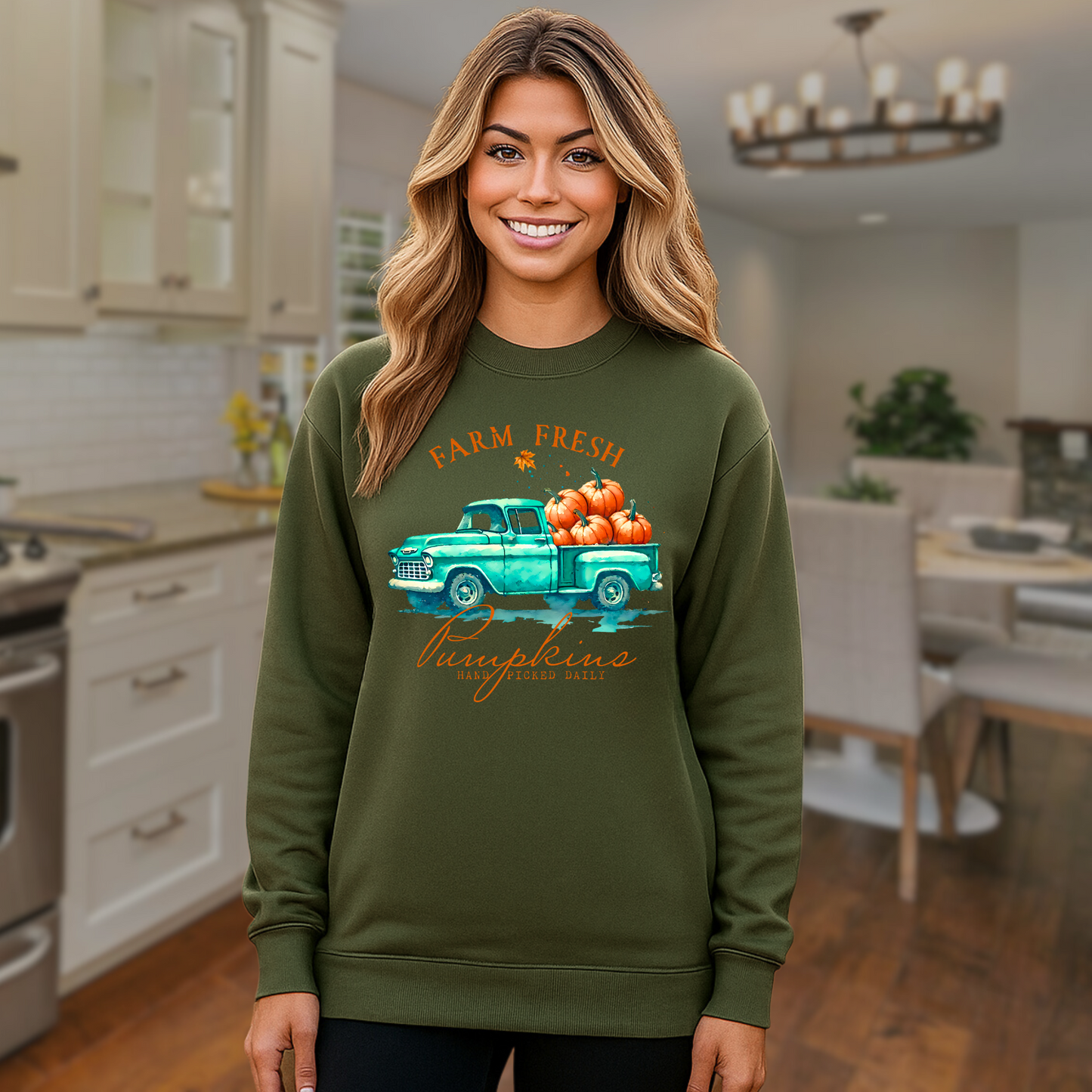military green pumpkin patch sweatshirt modeled in an indoor setting
