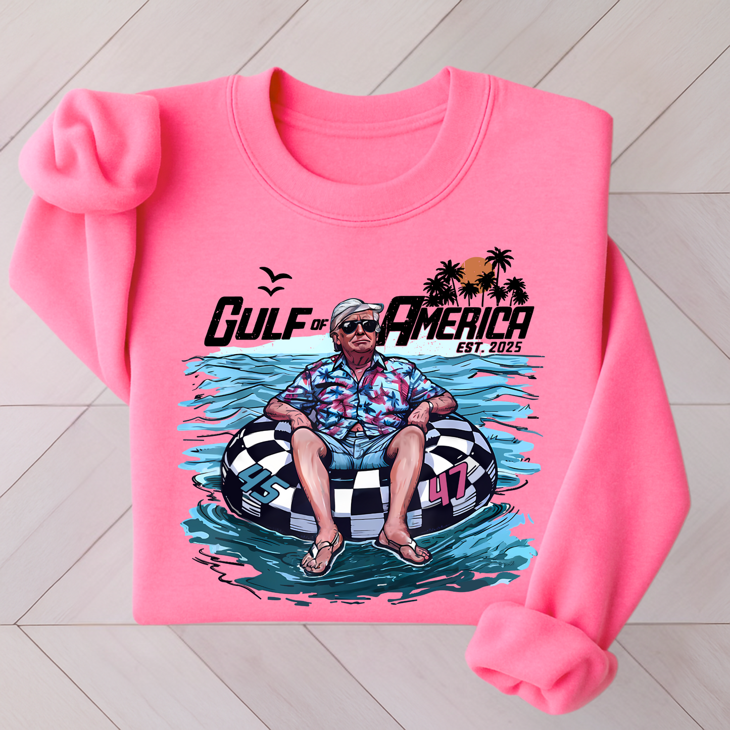 Bright pink Gulf of America sweatshirt – funny Trump floating in pool illustration