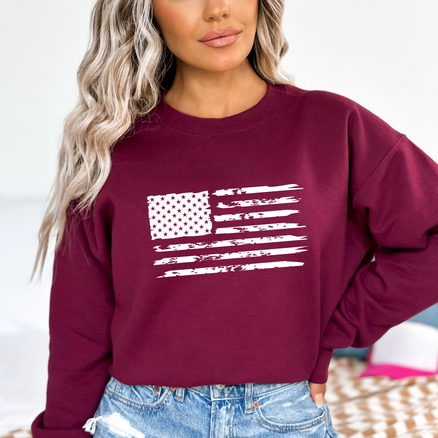 Maroon sweatshirt with White American flag on the front and bold Pro God, Pro Gun, Pro Life, Pro Trump text on the back. Patriotic Christian conservative apparel