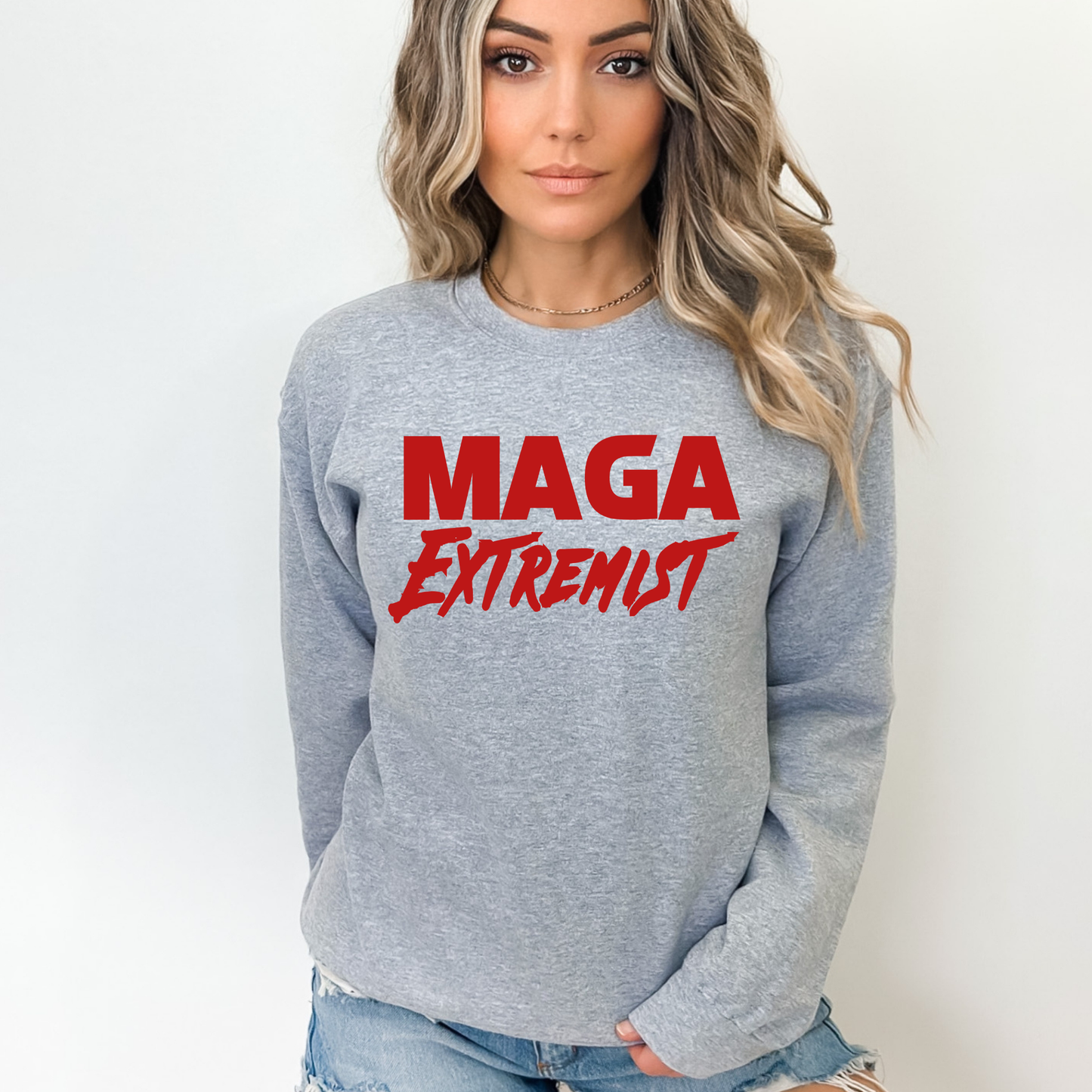 Gray women’s sweatshirt styled with MAGA Extremist print