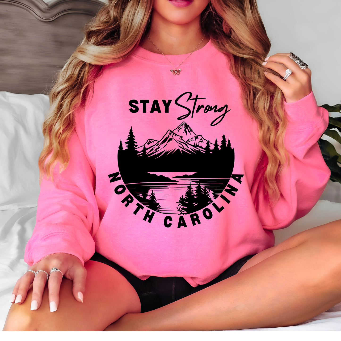 Show your support for those affected by Hurricane Helene in Western North Carolina with this custom "North Carolina Stay Strong" design. The majority of proceeds from these sales will be donated directly to families affected. 