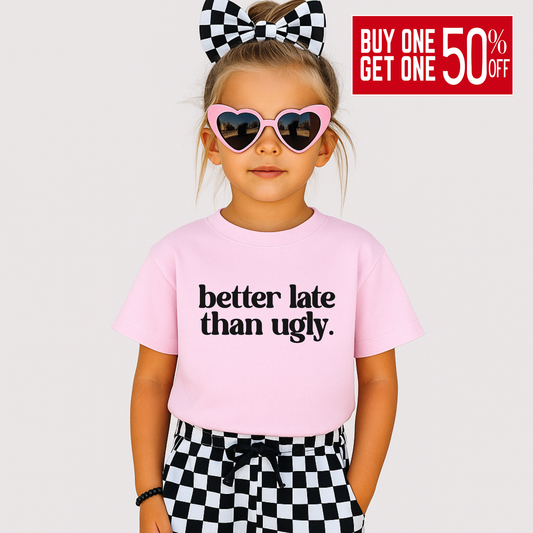 Tween girl in pink tee and checker bow with “Better Late Than Ugly” text – trendy youth fashion