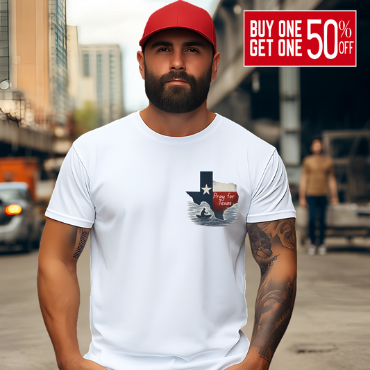 White unisex Pray for Texas shirt modeled outdoors. Features Christian-inspired Texas flood graphic on front chest.

