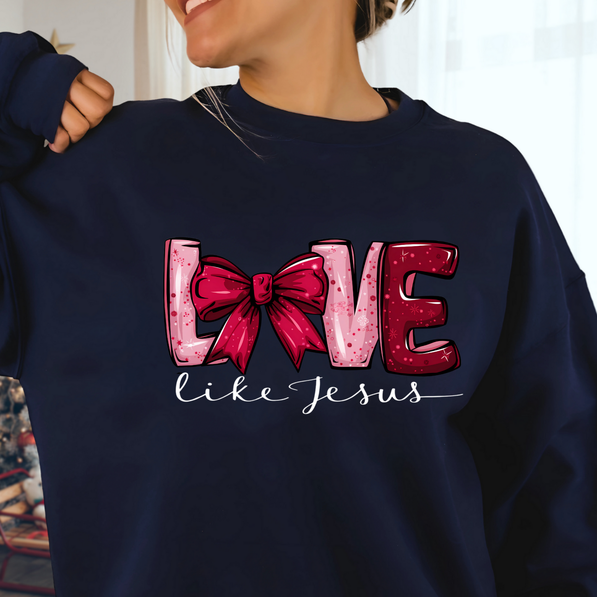 A woman wearing a Navy sweatshirt with the text 'LOVE ' printed on the front.