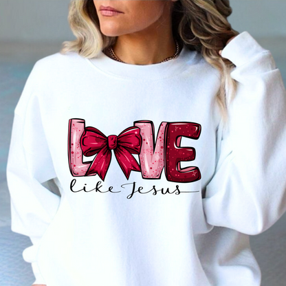 A woman wearing a white sweatshirt with the text 'LOVE' printed on the front.