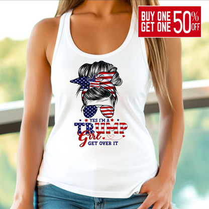A woman wearing a white tank top with a graphic design that includes the American flag and text