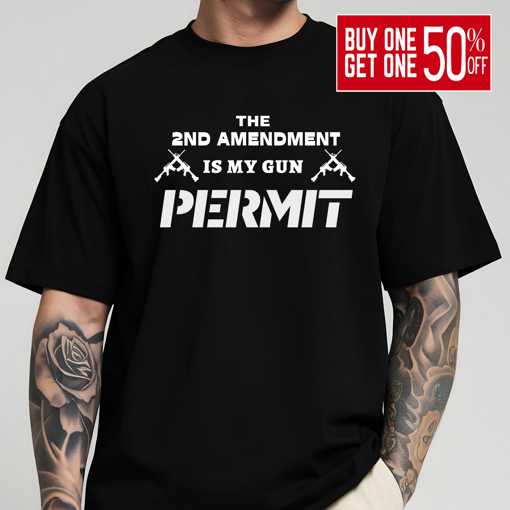 Black t-shirt with white 2nd Amendment gun rights permit graphic worn by tattooed man