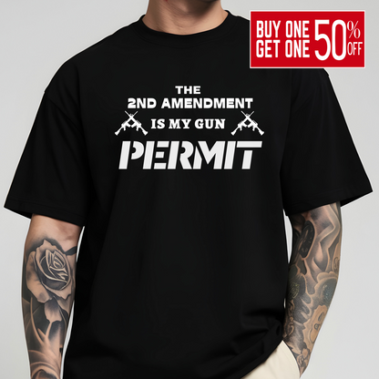 Black t-shirt with white 2nd Amendment gun rights permit graphic worn by tattooed man