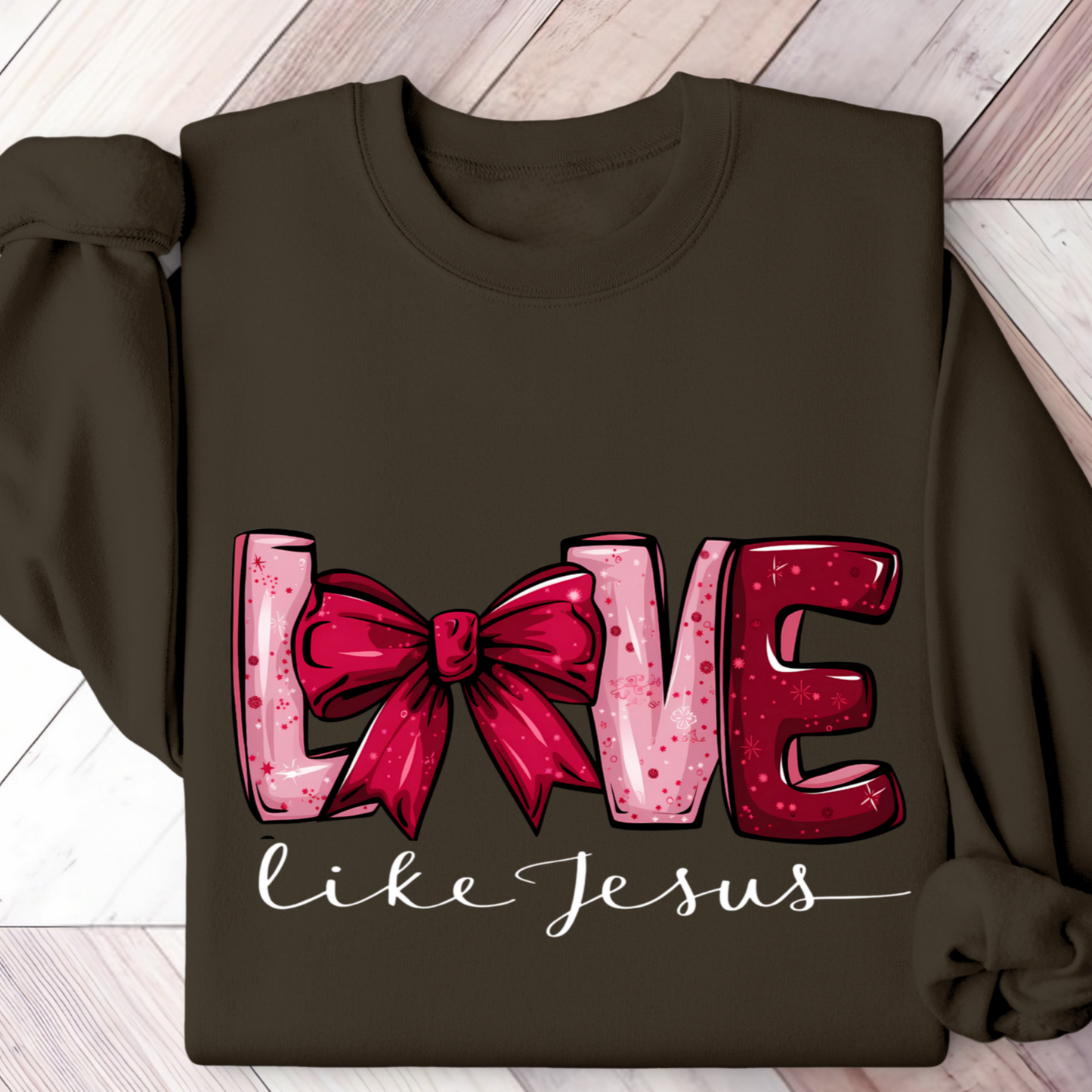Brown sweatshirt with 'LOVE ' design on a wooden floor