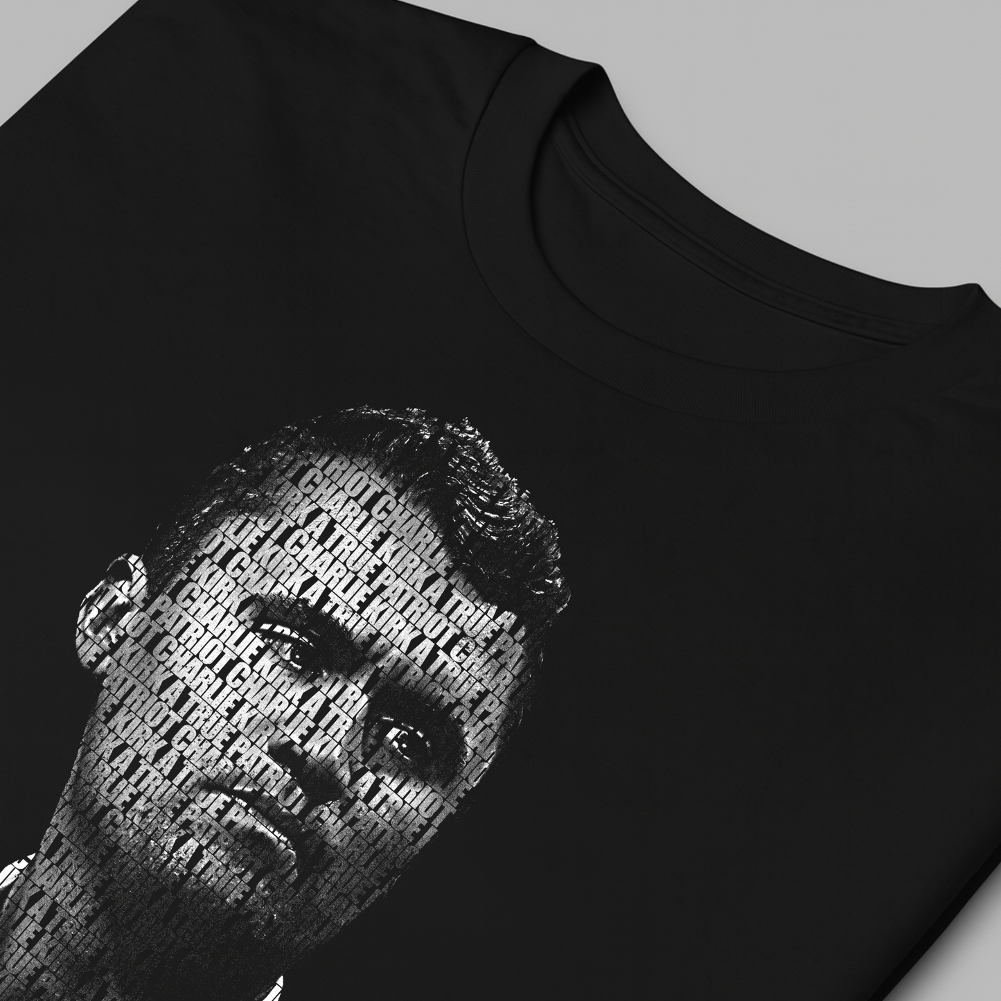 Charlie Kirk memorial t-shirt typography detail A True Patriot text design close-up