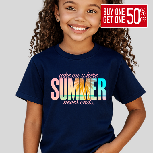 Close-up of navy t-shirt with beach sunset and palm tree graphic, worn by smiling youth girl