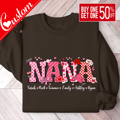 Custom Valentines Day shirt in Brown sweatshirt with 'NANA' and names printed on a wooden floor