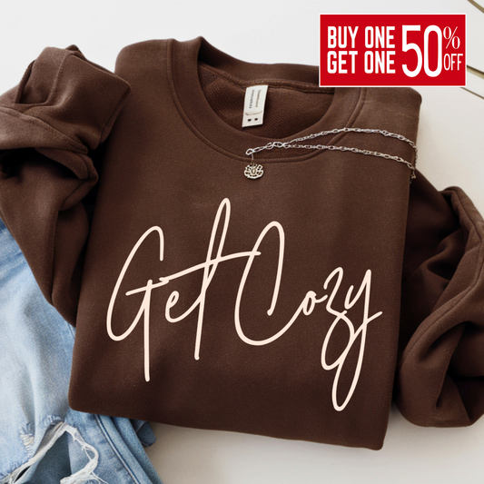 Brown sweatshirt with 'Get Cozy' text on a white background