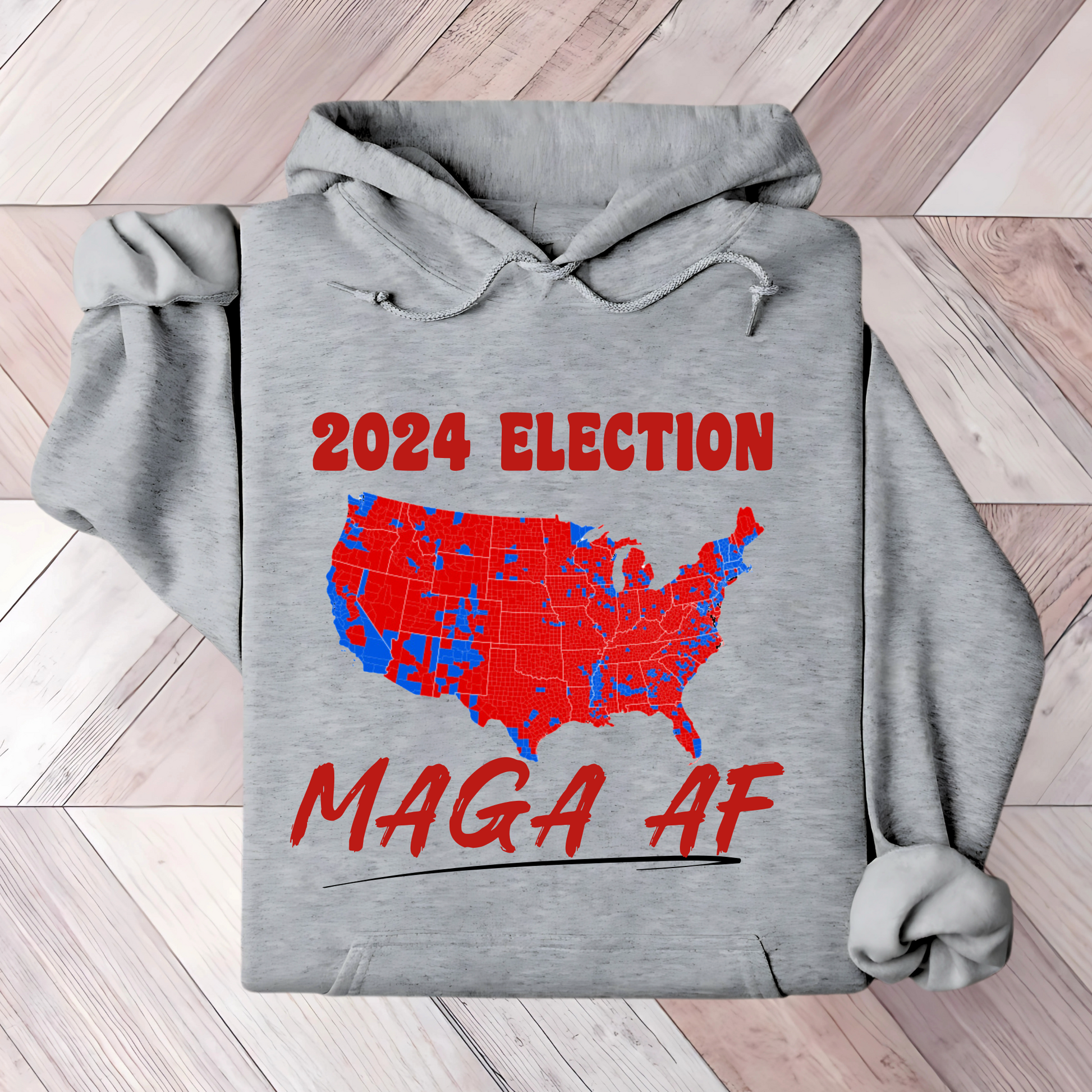 Gray Folded patriotic hoodie featuring red and blue American map with bold text