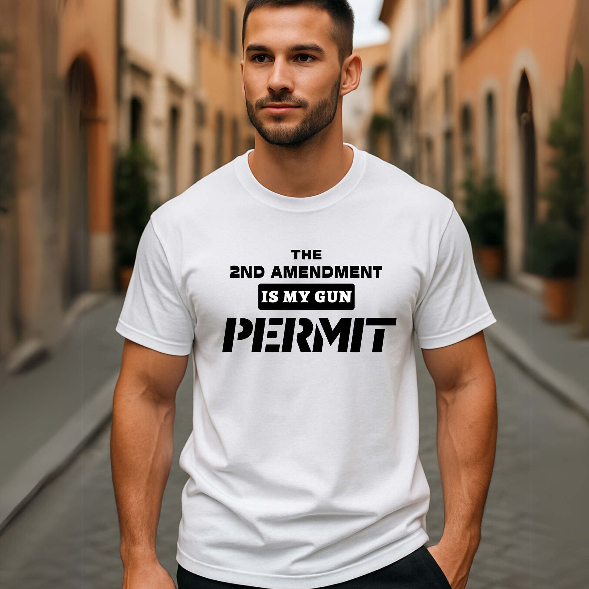 Man walking in a white t-shirt with black pro-gun “2nd Amendment Is My Gun Permit” design
