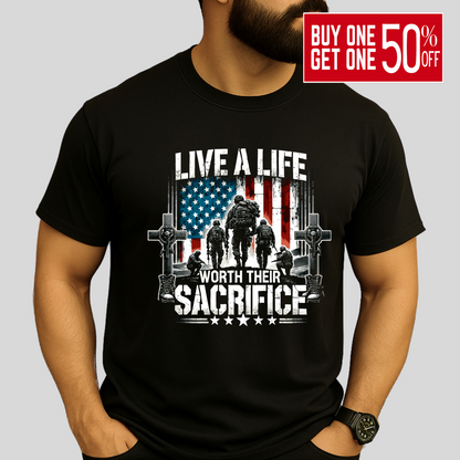 Man wearing black Live a Life Worth Their Sacrifice t-shirt with patriotic soldier and flag graphic