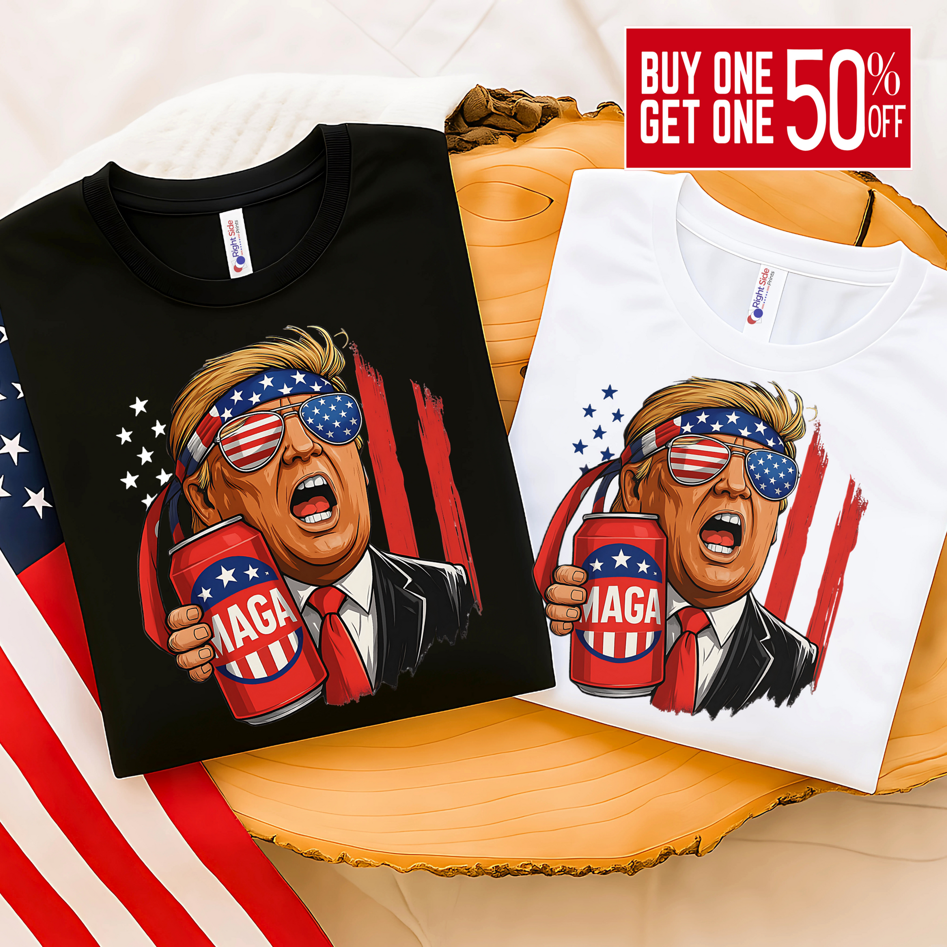Folded black and white tees with Trump MAGA beer print, USA flag in background, perfect for patriotic gift ideas.