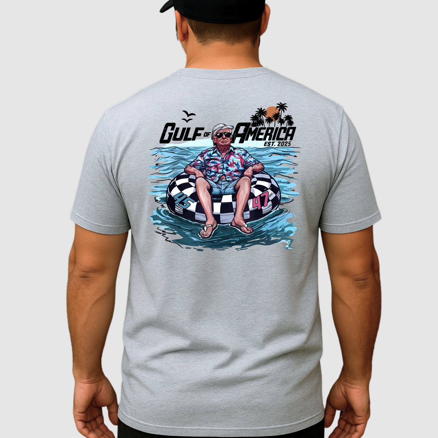 Close-up back view of cartoon Trump in checkered tube on light gray tee