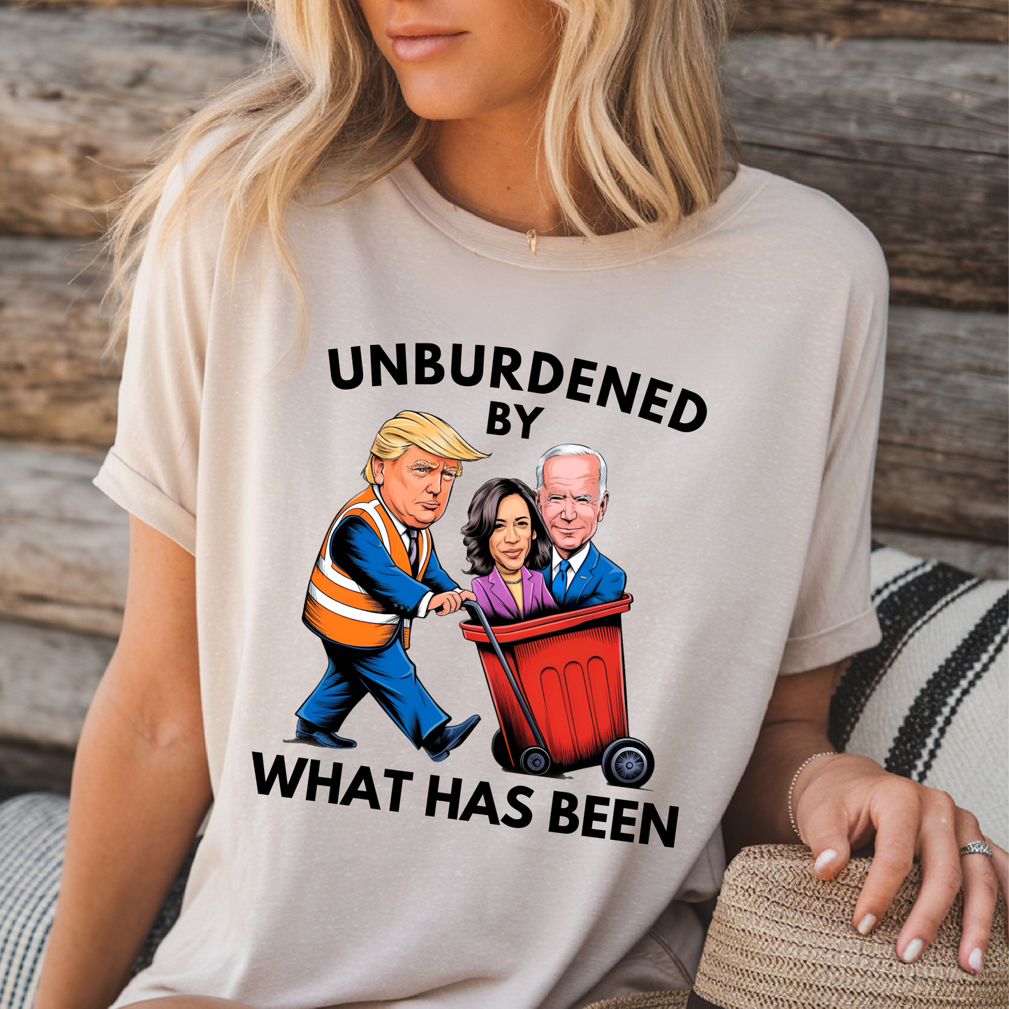 Sand color relaxed fit shirt with cartoon Trump throwing away Biden and Kamala – women's political statement tee